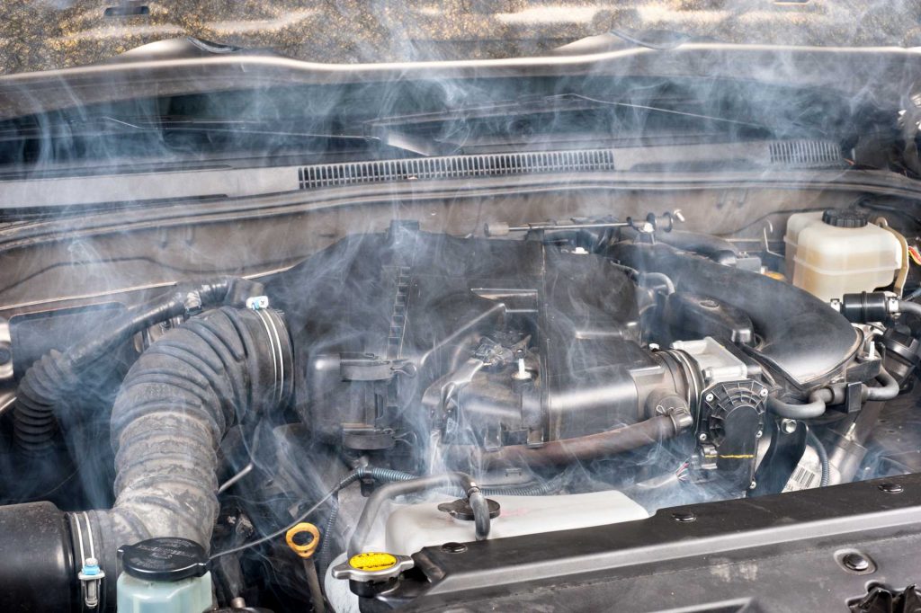 car keeps overheating, close up of car engine overheated